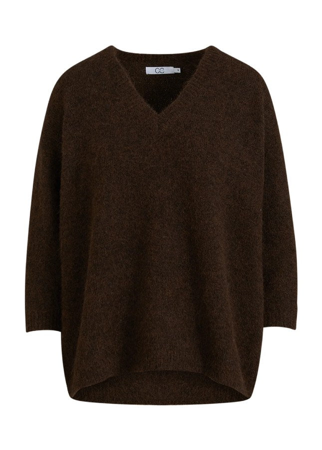 Bruine knit Amerlia CC Heart I Mooie Alpaca V-Hals trui van het merk CC Heart. De bruine Amelia trui heeft een V-Hals, driekwart mouwen en is aan de achterkant langer. De trui is gemaakt van een mooie zachte kwaliteit wolmix. Shop de nieuwe collectie dames truien, bruine truien, CC Heart truien online bij Boetiek Aniek