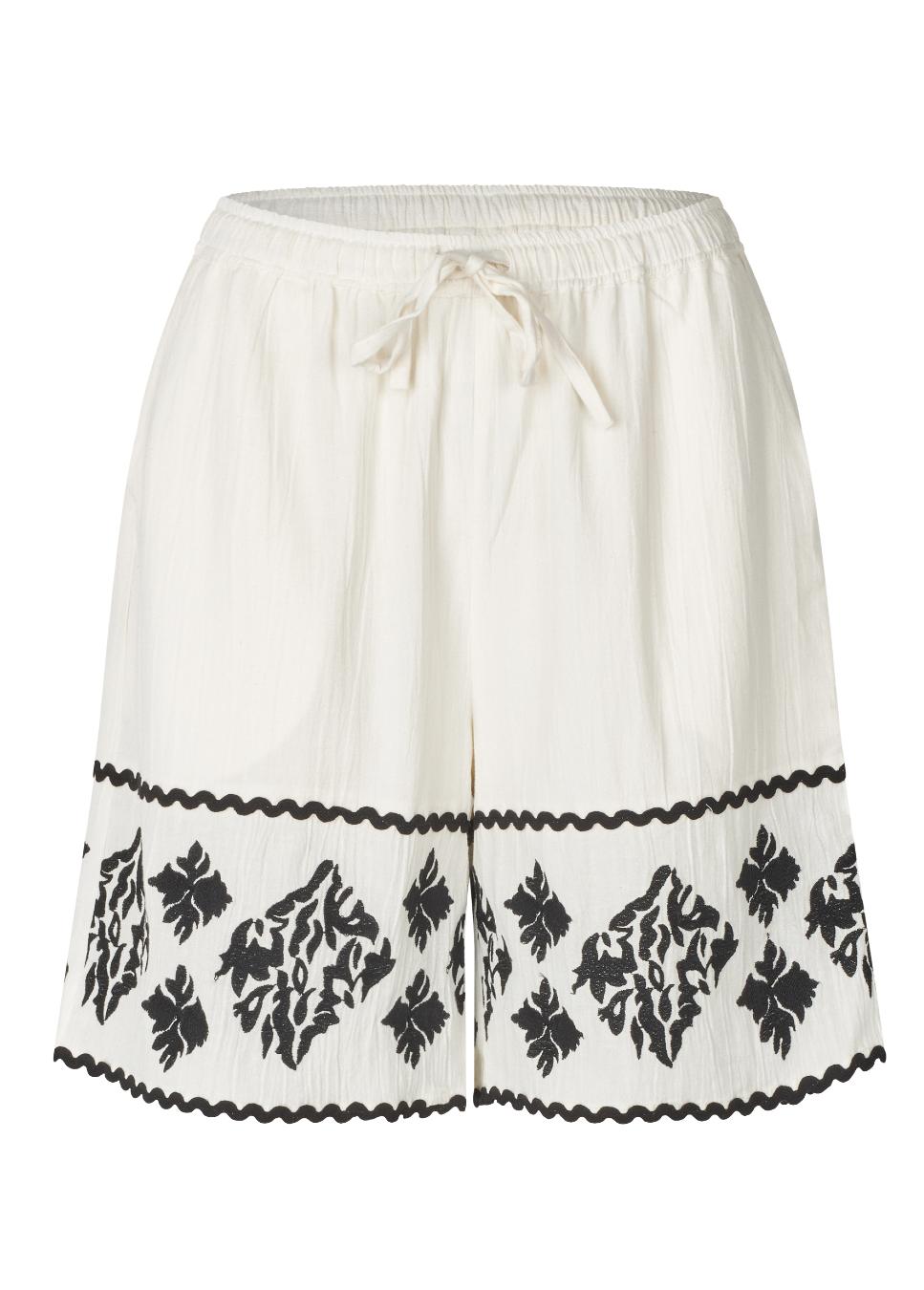 product foto voorkant van de mbyM short met details beige en zwart vankleur