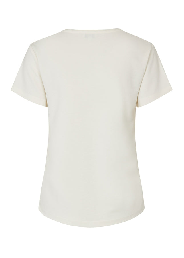 Wit basic V-hals T-shirt Luvanna van het merk mbyM. Het T-shirt is gemaakt van duurzame Modal kwaliteit. Shop de nieuwe collectie basis T-shirts, basic duurzame T-shirts, witte niet doorschijnende tops van de merken mbyM en Modstrom. Shop online dames T-shirts bij online dameskleding Boetiek Aniek.